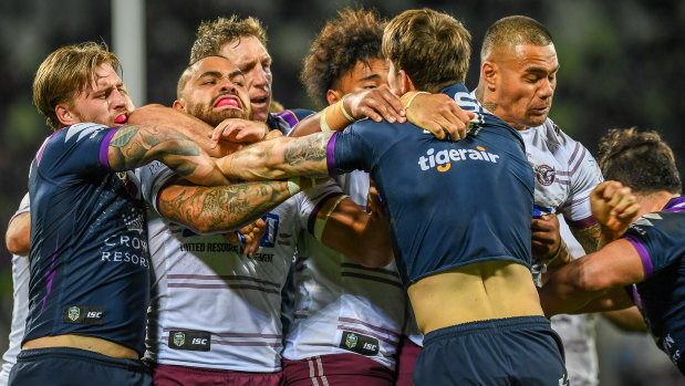 Big stink: Storm and Manly players clash in Melbourne before Curtis Scott is shown a red card.