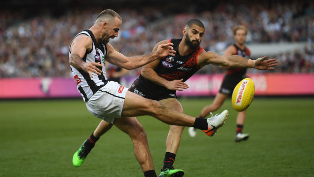 Steele Sidebottom (left) and Adam Saad: The round 23 clash between the Pies and Bombers will have big implications.