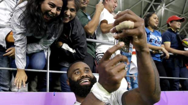 Semi Radradra takes a selfie for fans in Oita after the loss to Wales in the Rugby World Cup.