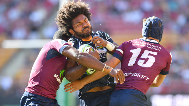 Brumbies winger Henry Speight running into heavy traffic. 