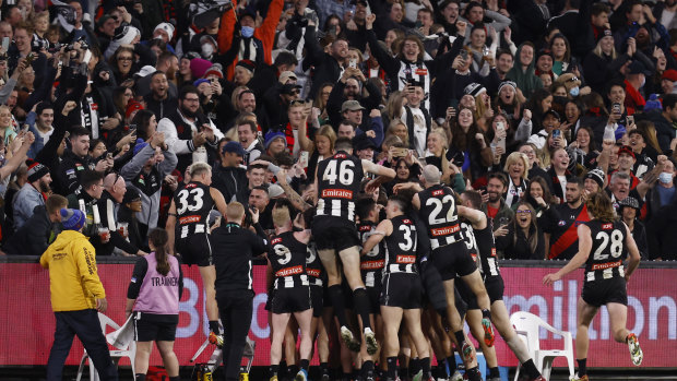 Collingwood celebrate Jamie Elliott’s post-siren match-winner against Essendon in round 19 last year.