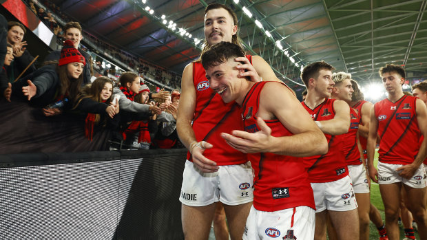 Sam Draper congratulates Massimo D’Ambrosio after the Bombers’ round 14 win against St Kilda.