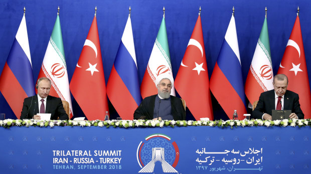 From left: Russian President Vladimir Putin, Iran's Hassan Rouhani and Turkey's Recep Tayyip Erdogan after they failed to agree on a diplomatic solution  in Tehran, Iran, on Friday.