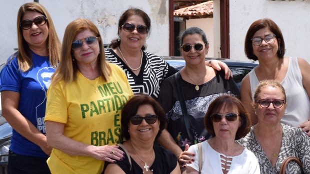 Backing Bolsonaro: Lourdes (yellow T-shirt), Fatima (second from left, back row) and Clea (left, front row).