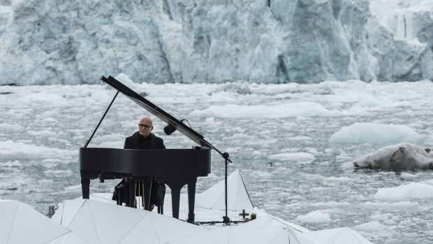 Italian composer and pianist Ludovico Einaudi performs  on a floating platform in the Arctic Ocean