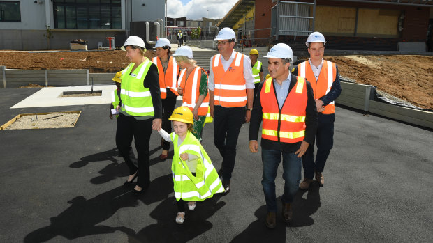 Daniel Andrews (centre)  Deputy Premier James Merlino (second from right) tour the new Pakenham Primary School on Wednesday.