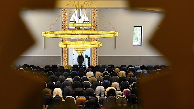 Male worshippers during the first prayer following the official opening of the Young Mosque
