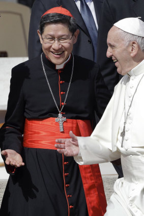 Pope Francis (right) with Cardinal Luis Antonio Tagle in 2017.