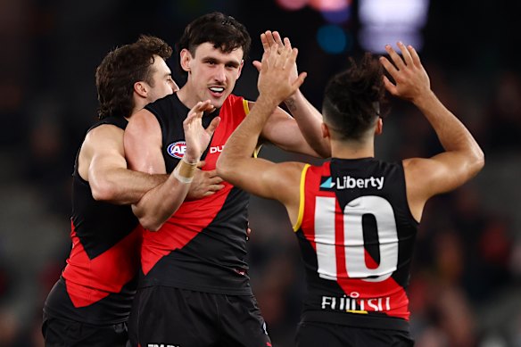 Liam McMahon of the Bombers celebrates a goal.