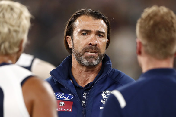 Geelong coach Chris Scott addresses his players during the MCG blockbuster against the Tigers.