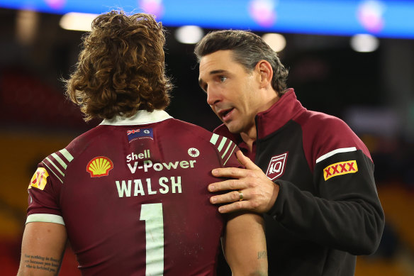 Queensland coach Billy Slater consoles fullback Reece Walsh after the Origin decider.