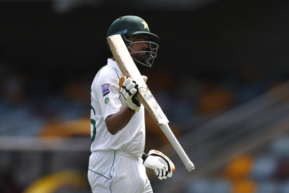 Pakistan's Babar Azam acknowledges the applause after being dismissed for 104 in Brisbane. 