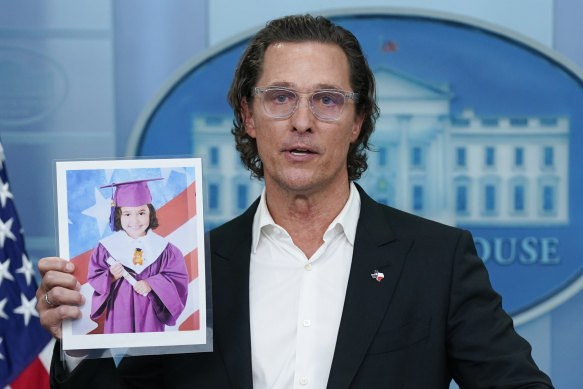Actor Matthew McConaughey holds a picture of Alithia Ramirez, 10, who was killed in the mass shooting at an elementary school in Uvalde, Texas, as he speaks during a press briefing at the White House.