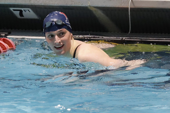 Swimmer Lia Thomas smiles after winning the 100-yard freestyle final at the Ivy League women’s championships at Harvard in February.