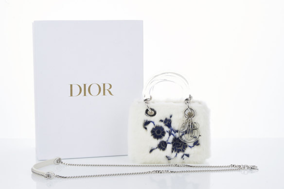 A limited-edition Dior handbag purchased with stolen funds by Melissa Caddick sold at auction for $7364.