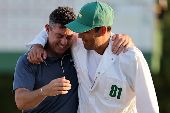 McIlroy, with caddie Harry Diamond, is overcome with emotion.