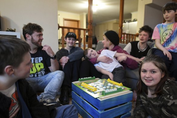 Tess Falconer and husband Darren with children Eric, Nic, Jorjia, Liam, Patrick and Chris.