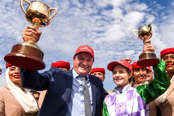 Darren Weir and Michelle Payne after Prince Of Penzance won the 2015 Melbourne Cup.