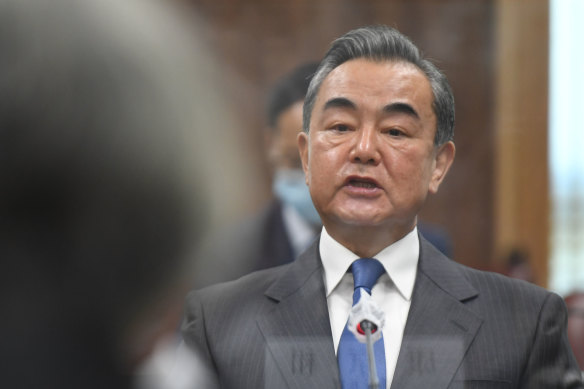 "I would kick the ball to Australia": China's Foreign Minister Wang Yi says the two nations can improve their relationship. 