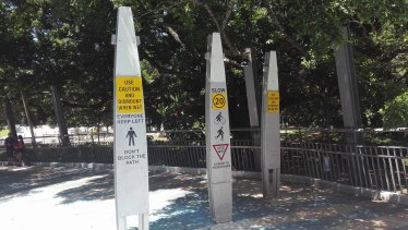 New signage for cyclist has been installed on the Goodwill Bridge as the State Government tries to fix a slippery path.