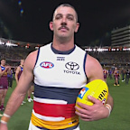 Taylor Walker leaves The Gabba.