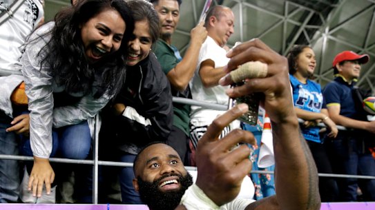 Semi Radradra takes a selfie for fans in Oita after the loss to Wales in the Rugby World Cup.