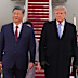 President Donald Trump and first lady Melania Trump walk with China’s President Xi Jinping and his wife Peng Liyuan at Joint Base Andrews, 