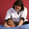 Lionel Messi with an infant Lamine Yamal.