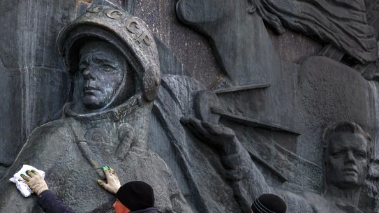 A bas-relief of Yuri Gagarin, the first person who flew to space, is cleaned ahead of Cosmonautics Day, which this year marks the 60th anniversary of Gagarin’s pioneering mission on April 12 1961.