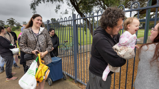 Kylie Whitlock, 36, and Aaron Eastgate , 28 with Evie , 13 months.