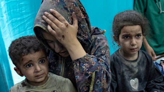 Palestinians wounded in Israeli bombardment of the Gaza Strip are brought to a hospital in Khan Younis.