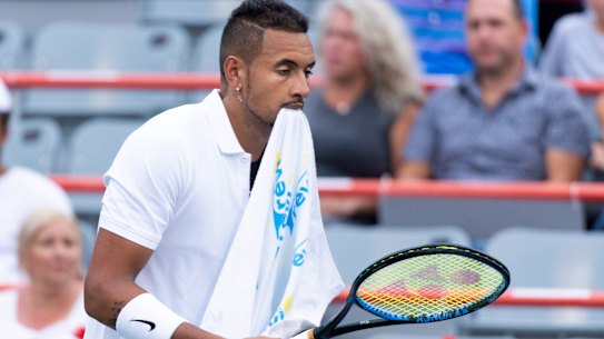 Towelled up: Nick Kyrgios argued with the umpire for most of the first set over not receiving a white towel.