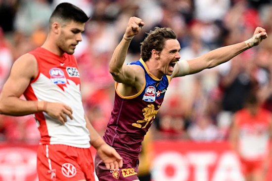  Joe Daniher of the Lions celebrates kicking a goal in the final minutes during the AFL Grand Final match between Sydney Swans and Brisbane Lions at Melbourne Cricket Ground, on September 28, 2024, in Melbourne, Australia