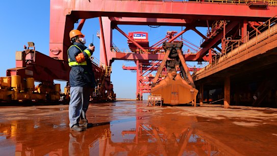 A ship unloader at Wu port of Taicang port unloading iron ore imported from Australia, Brazil and other countries. Prices for the metal have been sinking amid lower demand from China.