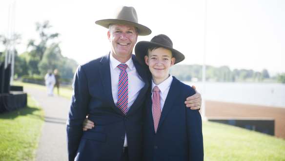 New Australian citizens Hans Koenderink and Noah Djavan Keoni Koenderink at the national citizenship ceremony in Commonwealth Park on Saturday.