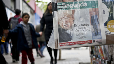 A local newspaper shows a newspaper front page about the defrocking of priest Fernando Karadima by Pope Francis, in Santiago, Chile.