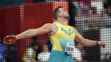 Matthew Denny competes in the men's discus qualification rounds in Doha.
