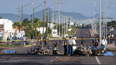 September 2016: police examine a military convoy in Culiacan, Mexico, ambushed with grenades and high-powered guns, killing five soldiers. Authorities attributed the ambush to the sons of Joaquin "El Chapo" Guzman.