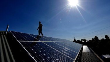 Less for more: Solar installations are running at record levels but feed-in tariffs are to be cut in NSW.
