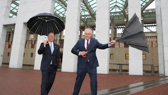 Treasurer Josh Frydenberg and Prime Minister Scott Morrison outside Parliament House.