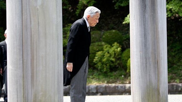 Japan's Emperor Akihito arrives at Musashino Imperial Mausoleum to visit the tomb of his late father Hirohito to report his retirement in Tokyo on Tuesday.