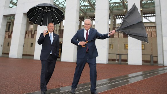Treasurer Josh Frydenberg and Prime Minister Scott Morrison outside Parliament House.
