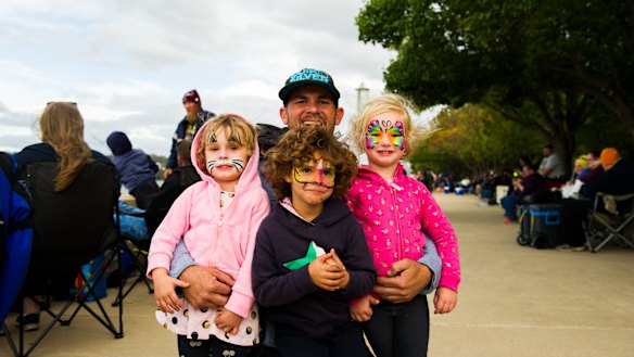 The Benny family: Andrew with Matilda, 4, Jakaya, 5, and Lucy, 4. 