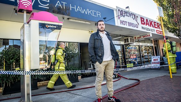 Owner Dimitri Yianoulakis outside Olive at Hawker, which was severely damaged by fire on Tuesday night.