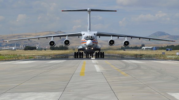 A Russian transport aircraft, carrying parts of the S-400 air defense systems, lands at Murted military airport in Ankara, Turkey.