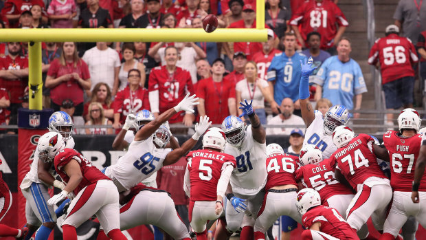 Arizona's Zane Gonzalez kicks a field goal as the Cardinals fought back for an unlikely draw at home to the Detroit Lions.