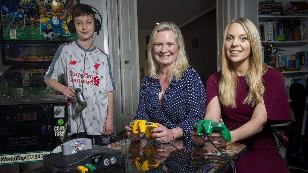 Julie-Ann Whitecross with her children Matthew Whitecross and Holly Steer. Julie-Ann and Holly are Nintendo 64 fans, while Matthew prefers playing the PlayStation 4 online with his friends.
