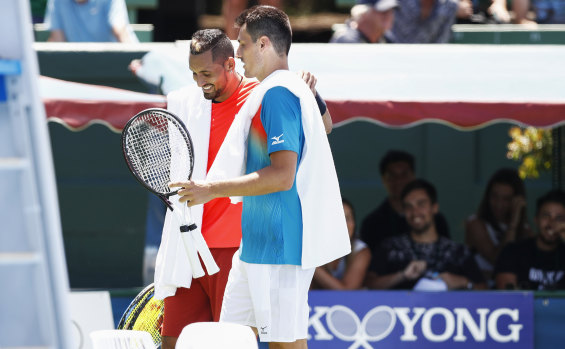 Nick Kyrgios (right) and Bernard Tomic after their friendly at Kooyong.