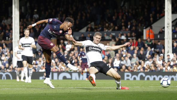 Pierre-Emerick Aubameyang fires home Arsenal's fifth goal against Fulham.