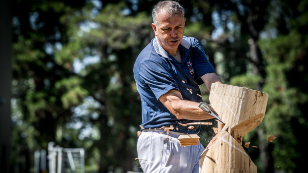 Andrew Wiseman, the show's woodchopping sector head, demonstrating the skill.
